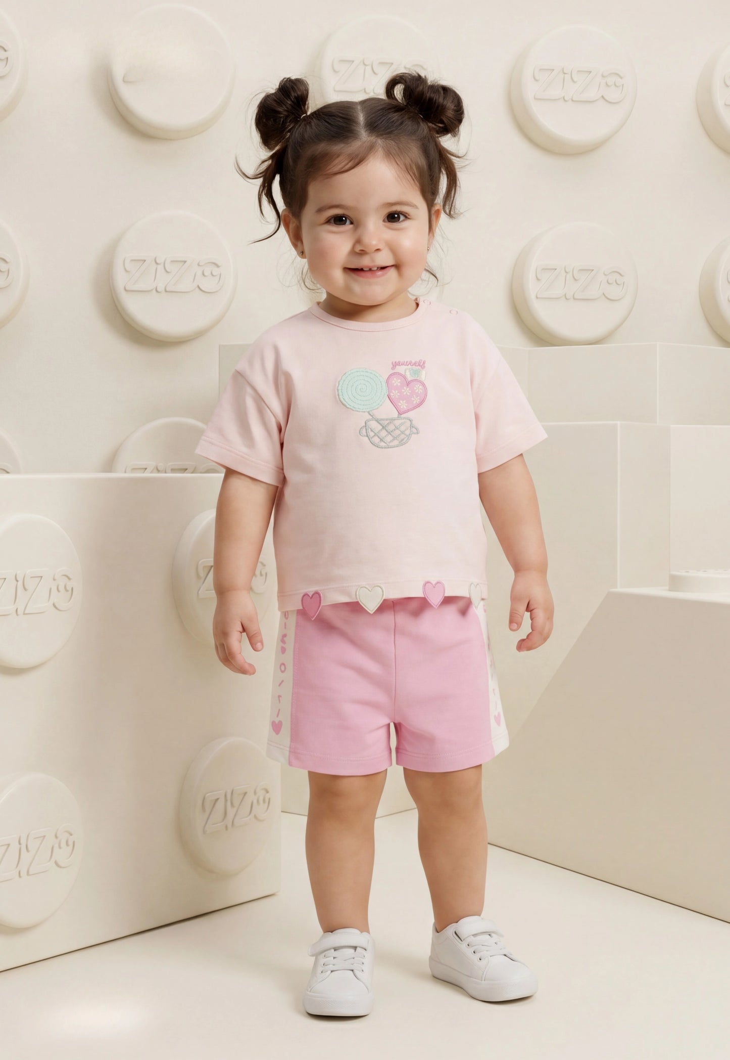 A delightful baby girl's pajama set designed for ages 9 to 18 months.1088