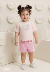 A delightful baby girl's pajama set designed for ages 9 to 18 months.1088