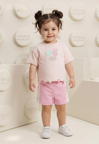 A delightful baby girl's pajama set designed for ages 9 to 18 months.1088