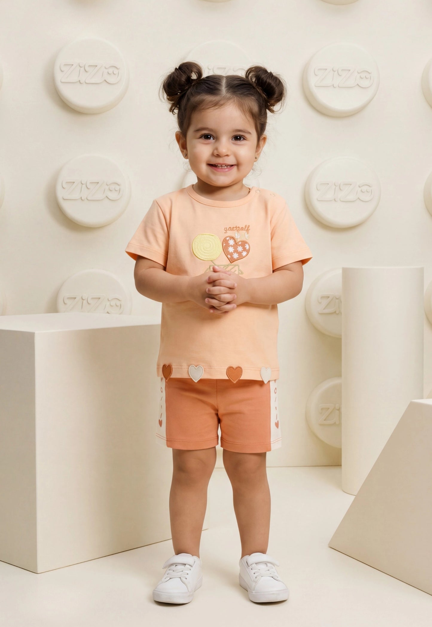 A delightful baby girl's pajama set designed for ages 9 to 18 months.1088